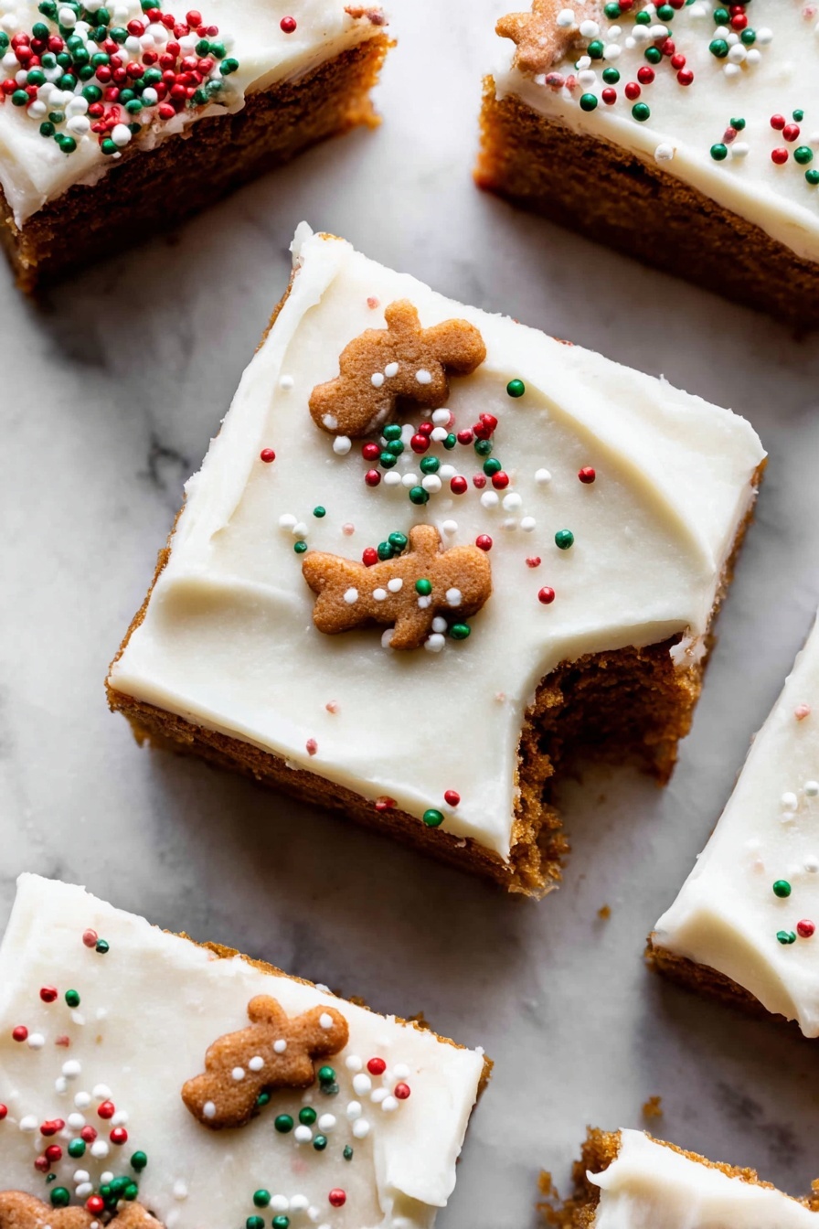 The image shows a close-up of nine square slices of a dessert arranged closely on a white marbled surface, each with two layers: a thick, darker brown base layer that looks soft and slightly textured, topped by a smooth, creamy white frosting layer evenly covering the surface. The frosting is decorated with small, flat gingerbread man-shaped brown sprinkles and tiny round sprinkles in red, green, and white, scattered mostly on the upper edges of the slices. The frosting has some gentle swirls and ridges, adding a soft texture to the visual. Photo taken with an iphone --ar 2:3 --v 7